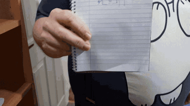 a person holding a piece of paper that says ' i 'm a ' on it