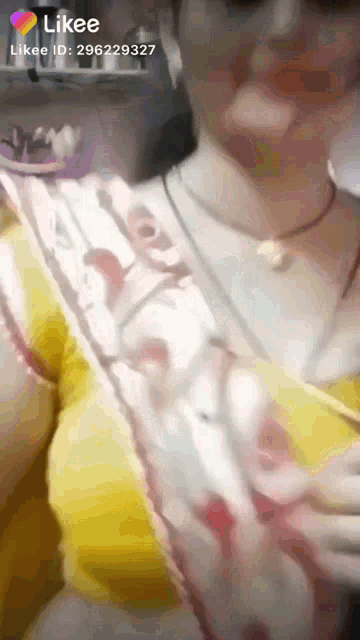 a likee video of a woman with a necklace