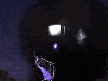 a blurred image of a stage with a sign that says ' a ' on it