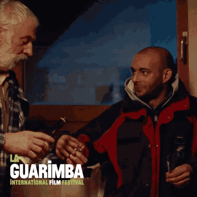 a poster for the guarimba international film festival features two men