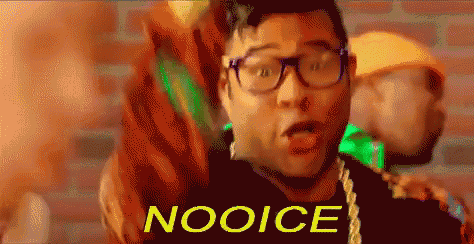 a man wearing glasses and a necklace says nooice in yellow letters