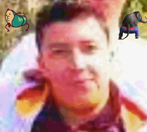a blurry picture of a man with a drawing of a monkey on his back