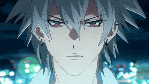 a close up of a person 's face with a serious look on his face