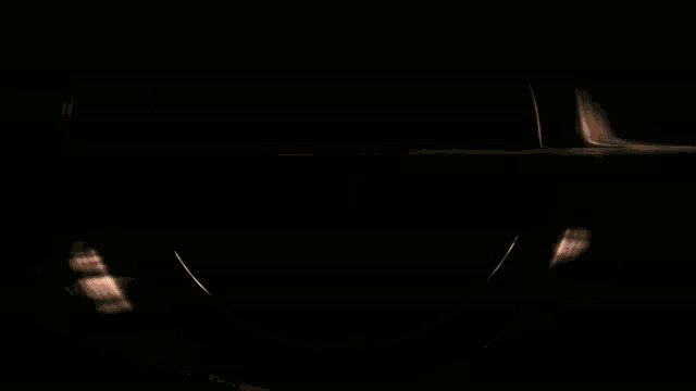 a glowing circle in the middle of a dark background