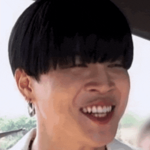 a close up of a person 's face with a funny face .