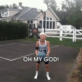 a person holding a basketball on a court with the words oh my god on the bottom right