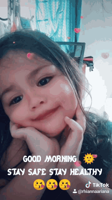 a little girl says good morning stay safe stay healthy on a tiktok