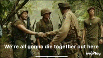 a group of soldiers shaking hands in the woods with the caption we 're all gonna die together out here .