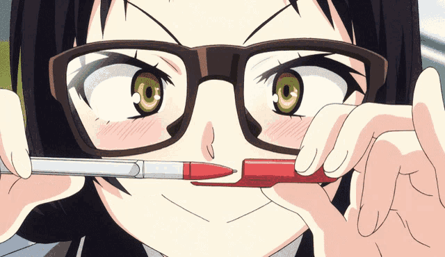 a girl with glasses holds a red pen to her mouth