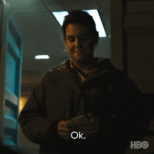 a woman in a dark room says ok in a hbo ad