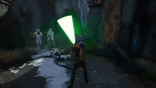 a green light is shining on a dark surface