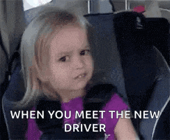 a little girl is sitting in a car seat with the words `` when you meet the new driver '' written below her .