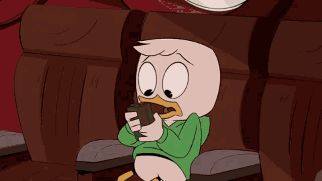 a cartoon character is sitting in a chair holding a walkie talkie