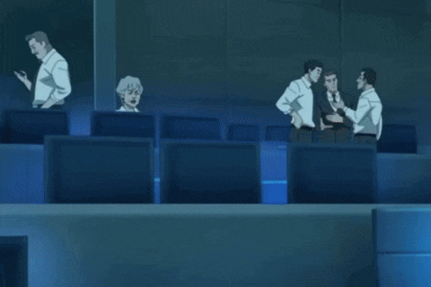 a group of people are gathered in a room with a lightning bolt coming out of a person 's head