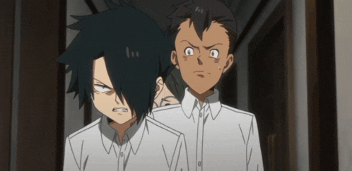 two anime characters are standing next to each other and one has a very angry look on his face