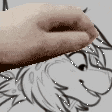 a close up of a person 's hand holding a piece of paper with a drawing on it .