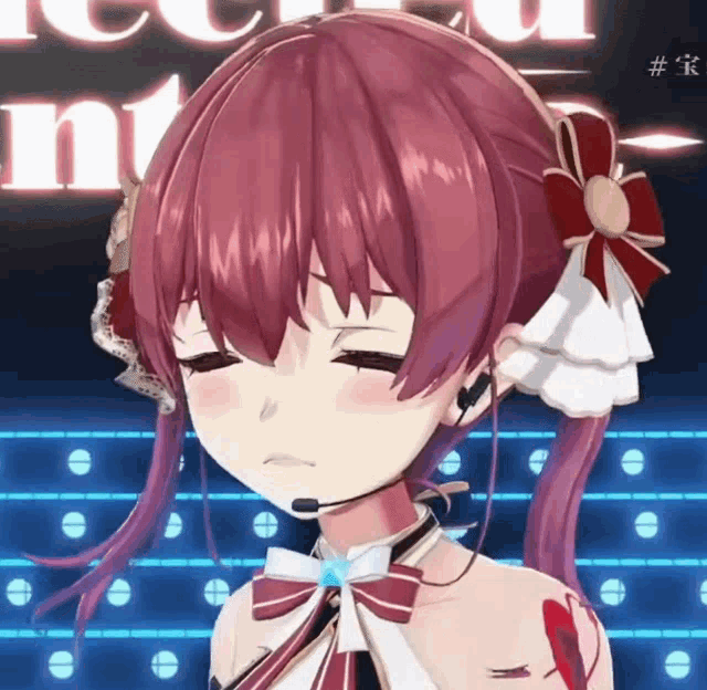 a close up of a girl with red hair and a microphone