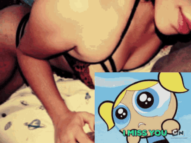 a woman laying on a bed next to a cartoon character that says i miss you cn