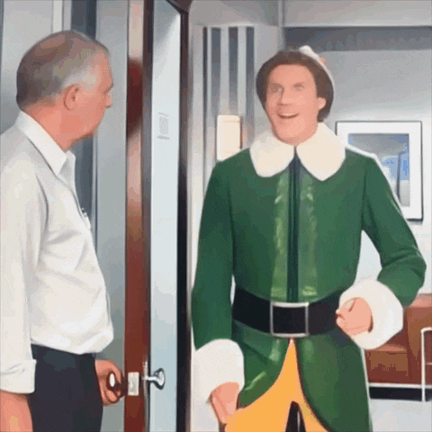 a man in a white shirt stands next to an elf in a green outfit