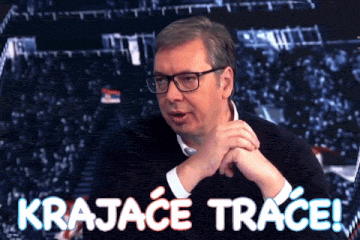 a man with glasses and the words krajace trace on the bottom