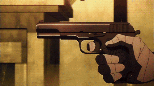 a person is holding a gun in their hand with a glove on