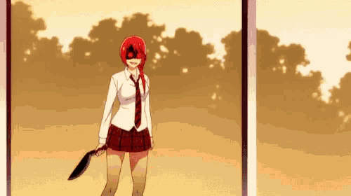 a girl with red hair is holding a frying pan in her hand