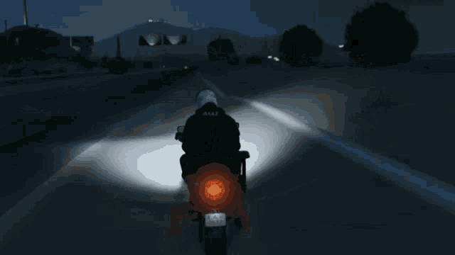 a man is riding a motorcycle with a license plate that says aax