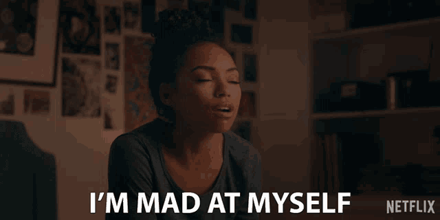 a woman says i 'm mad at myself in front of a netflix logo
