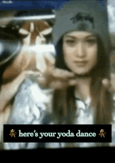 a blurred image of a woman with the words here 's your yoda dance