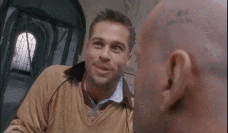 a bald man with a black eye and a bruise on his forehead