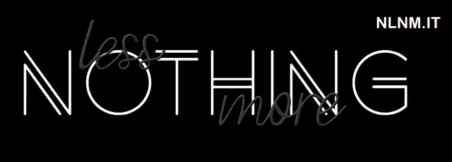 a neon sign that says less nothing more on a black background