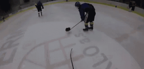 a hockey player wearing a jersey that says ' a ' on it