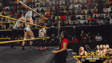 a wrestling match is being advertised on the nxt website