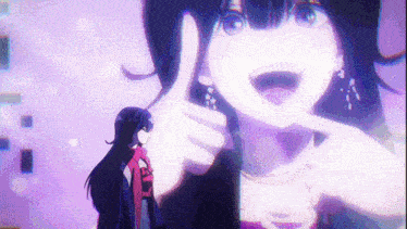 a girl is making a thumbs up sign in front of a giant anime character 's face .