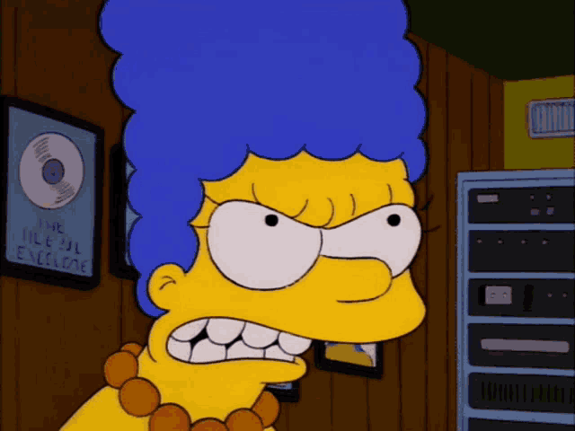 a cartoon of marge simpson with an angry look on her face in front of a sign that says the file is excelene