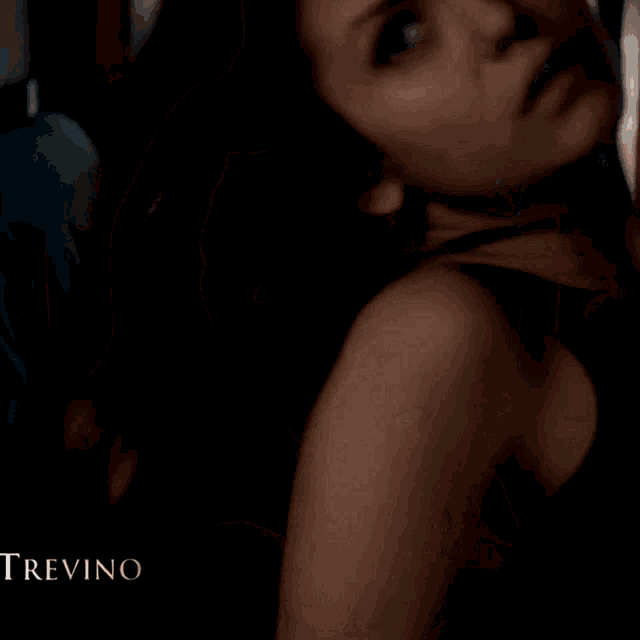 a picture of a woman with trevino written in the corner