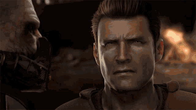 a man with a serious look on his face looks at another man