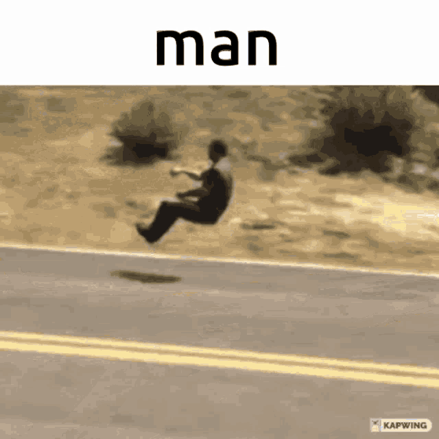 a man is flying over a road with the word man above him