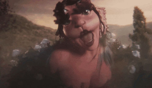 a close up of a woman making a funny face