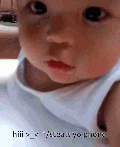 a close up of a baby 's face with the words hiii > < * / steals yo phone