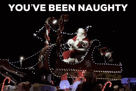 a sign that says " you 've been naughty " next to a santa claus sleigh