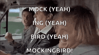 a group of people are sitting in a car and laughing while a man is driving .