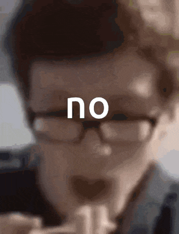 a close up of a person wearing glasses with the word no visible