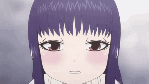 a close up of a girl with purple hair making a face