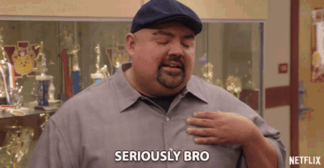 a man says seriously bro in front of trophies on display