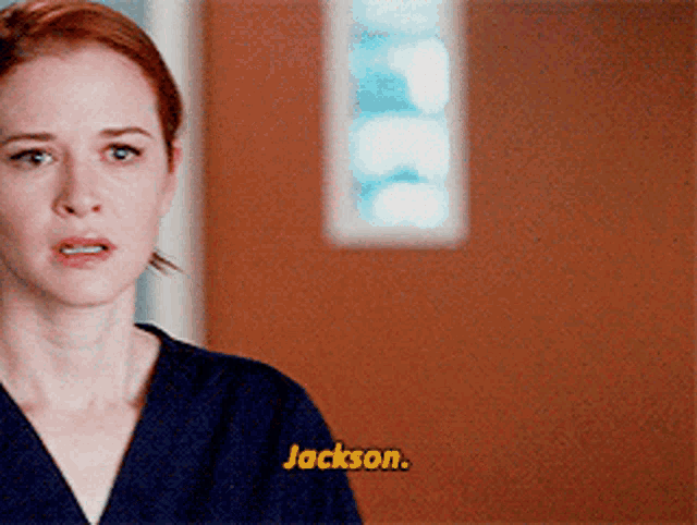 a close up of a woman 's face with the word jackson on the bottom