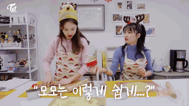 two women wearing aprons and hats with the word twice on them