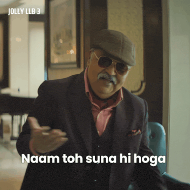 a man wearing sunglasses and a hat says naam toh sana hi hoga