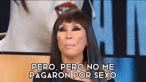 a woman with long black hair is sitting on a couch and says pero pero no me pagaron por sexo .