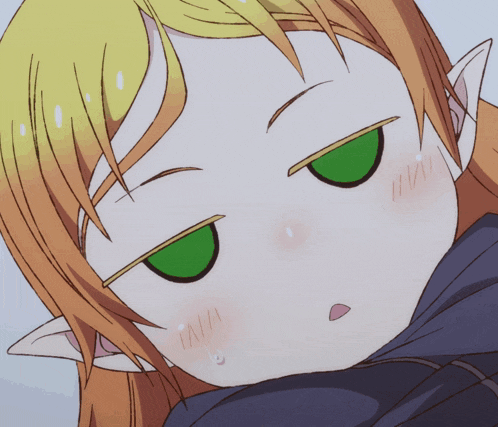 a close up of a girl with green eyes